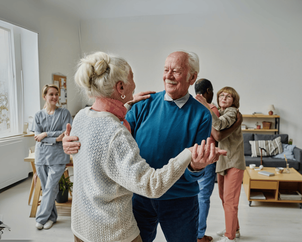 Happy senior couple dancing together
