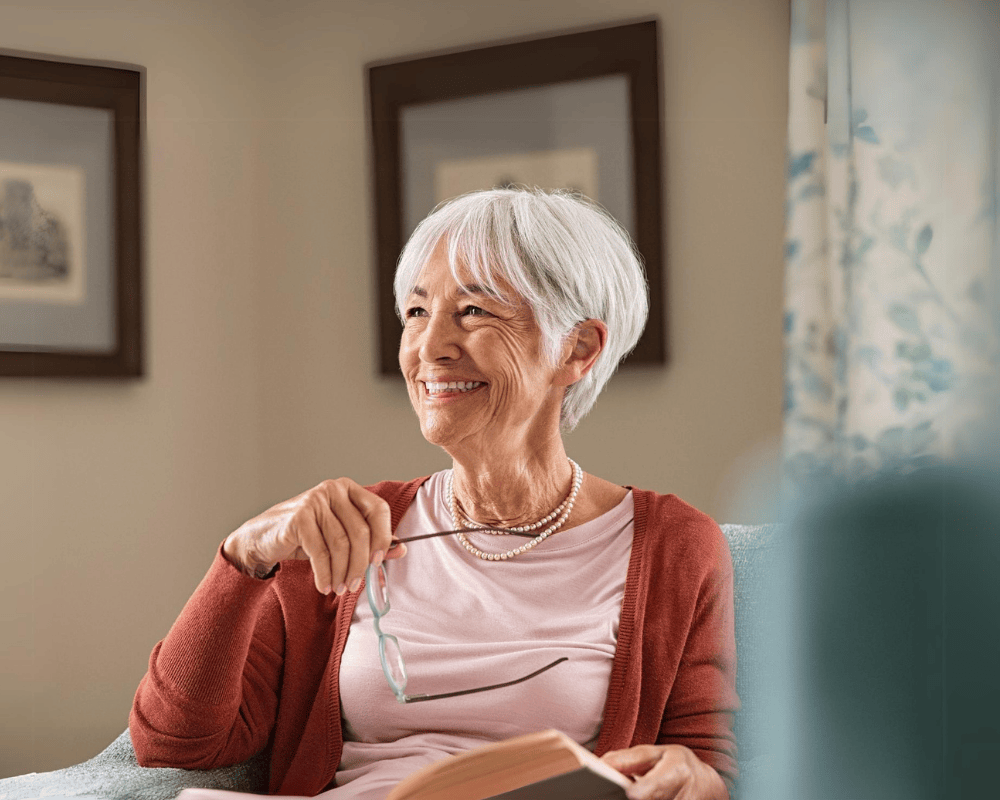 Happy senior woman smiling at home