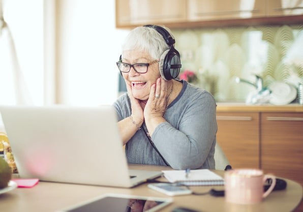Retiree on a call on her laptop