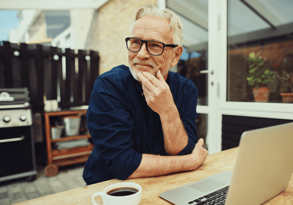 Retiree wondering at the computer