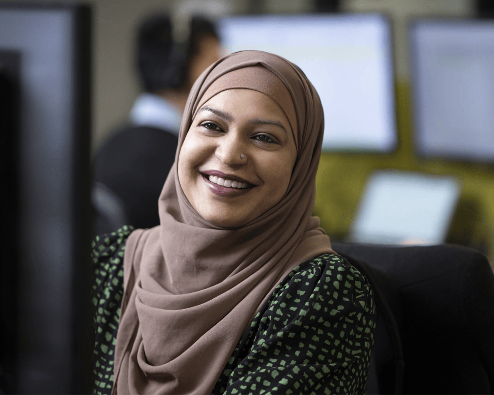Challenger employee smiling