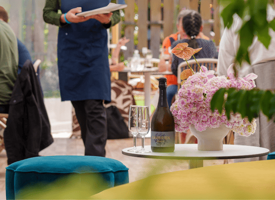 Waiter serving at a garden setting