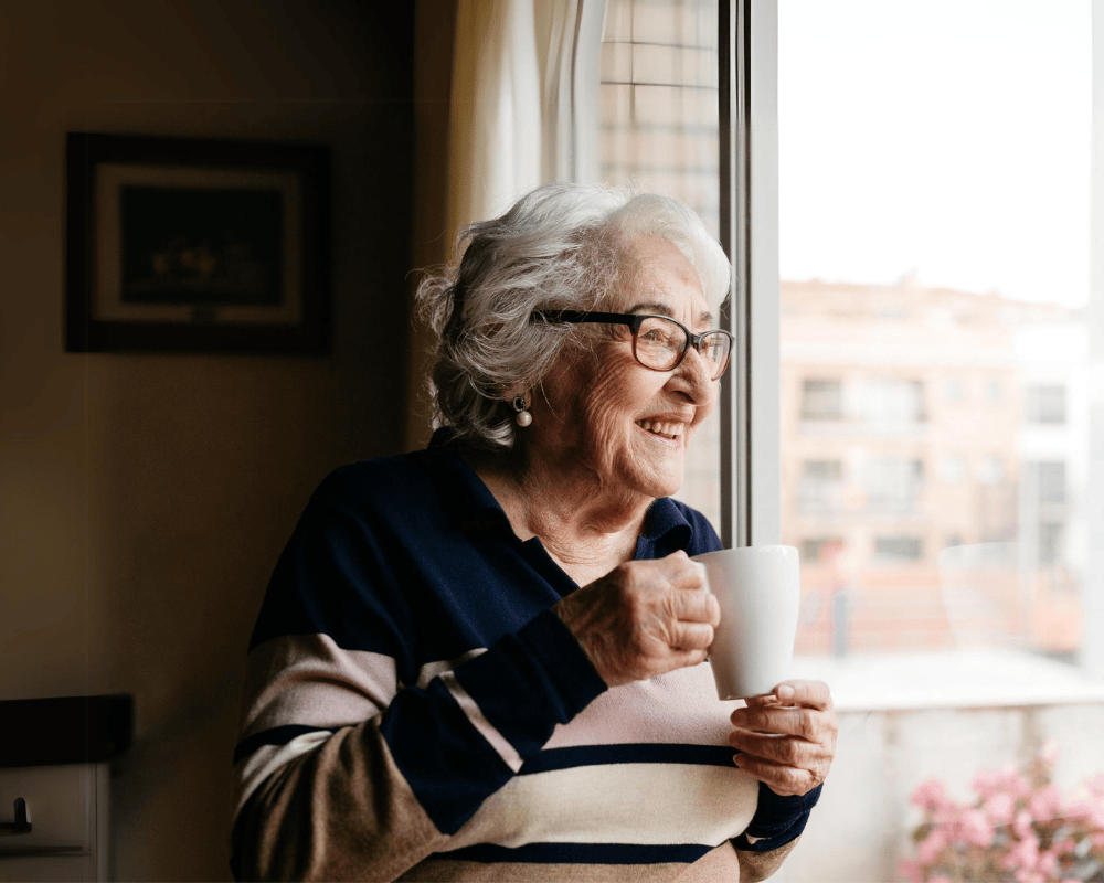 Retired lady drinking tea