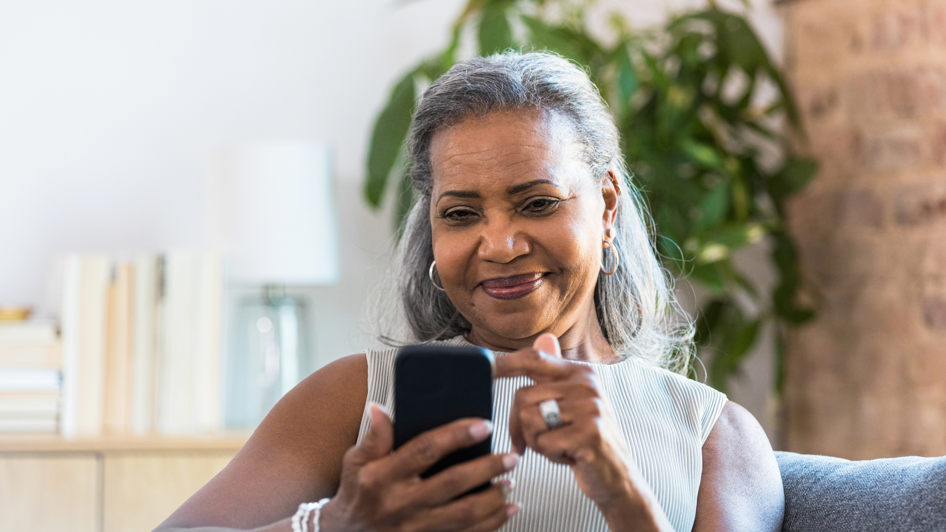 Lady sitting on her phone