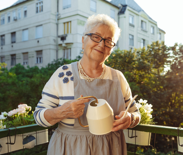 Retiree watering plants