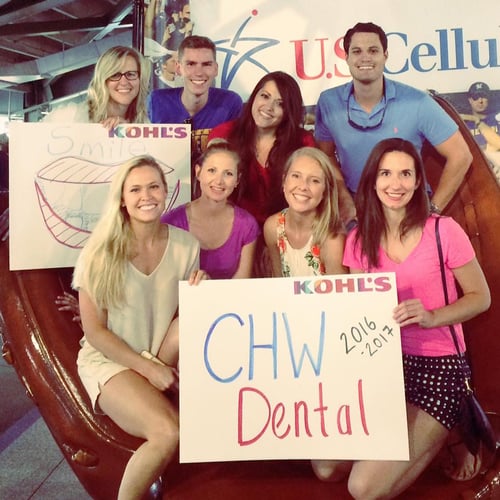 Photo of Children's pediatric dentistry residents at a baseball game in 2016