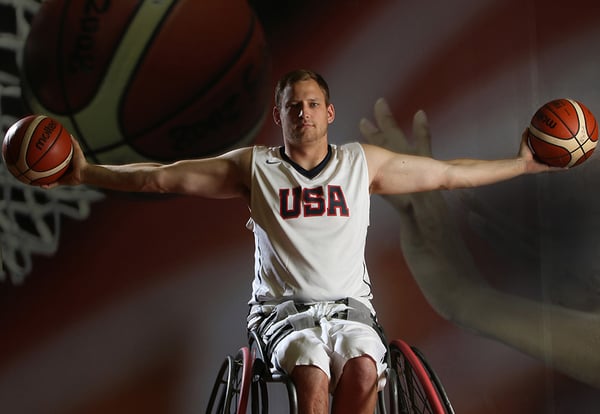 Nate Hinze holding basketballs