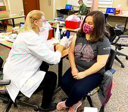 Wilma Santiago, supervisor, Urgent Care COVID-19 vaccine