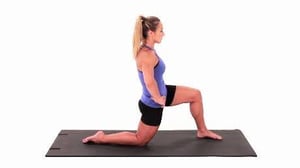 woman doing hip flexor stretch
