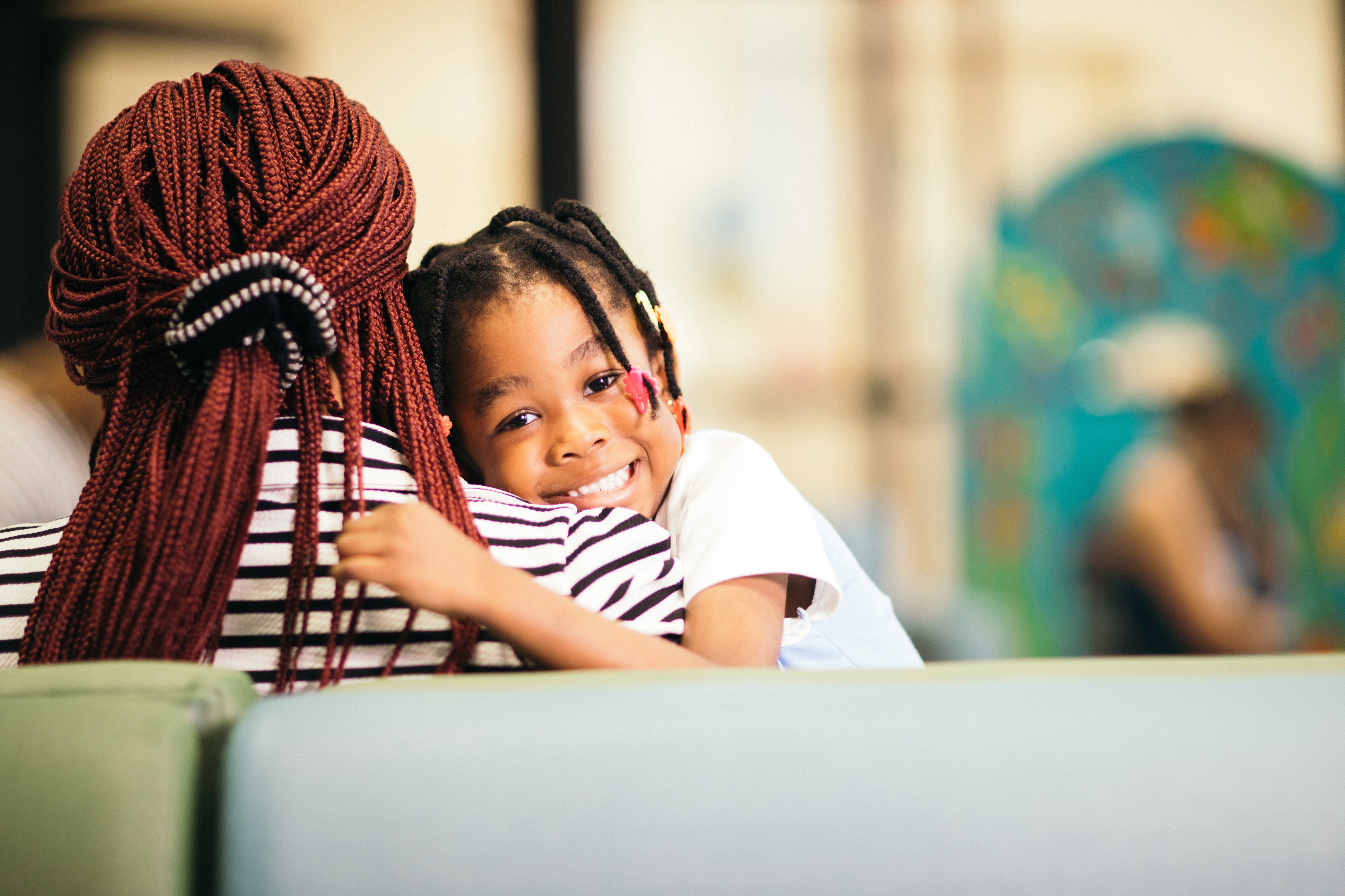 Patient and mother in waiting room