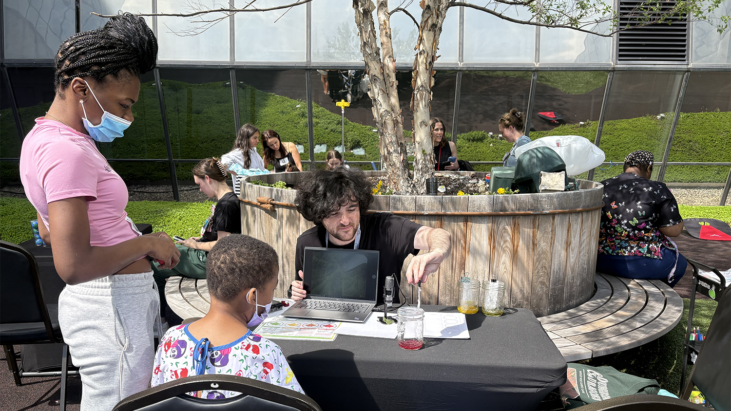 Child and mom working on a science project