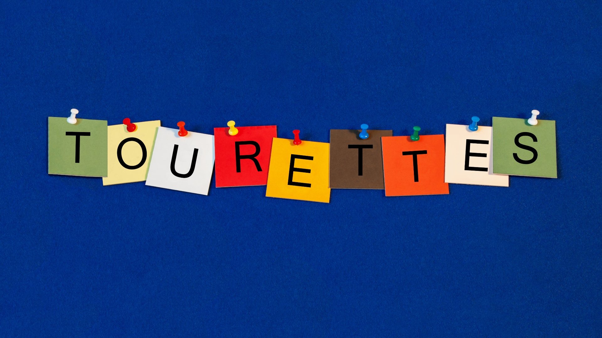 coloful letters spelling tourettes