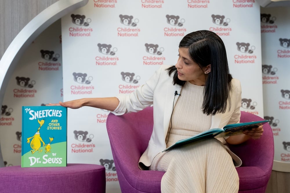 Second Lady Usha Vance reads a book to patients in the Family Resource Center at Children's National Hospital