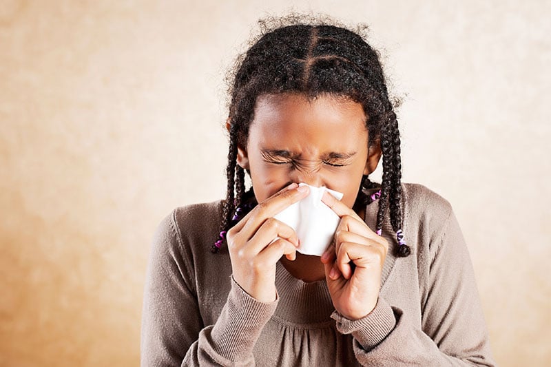 Picture of girl sneezing