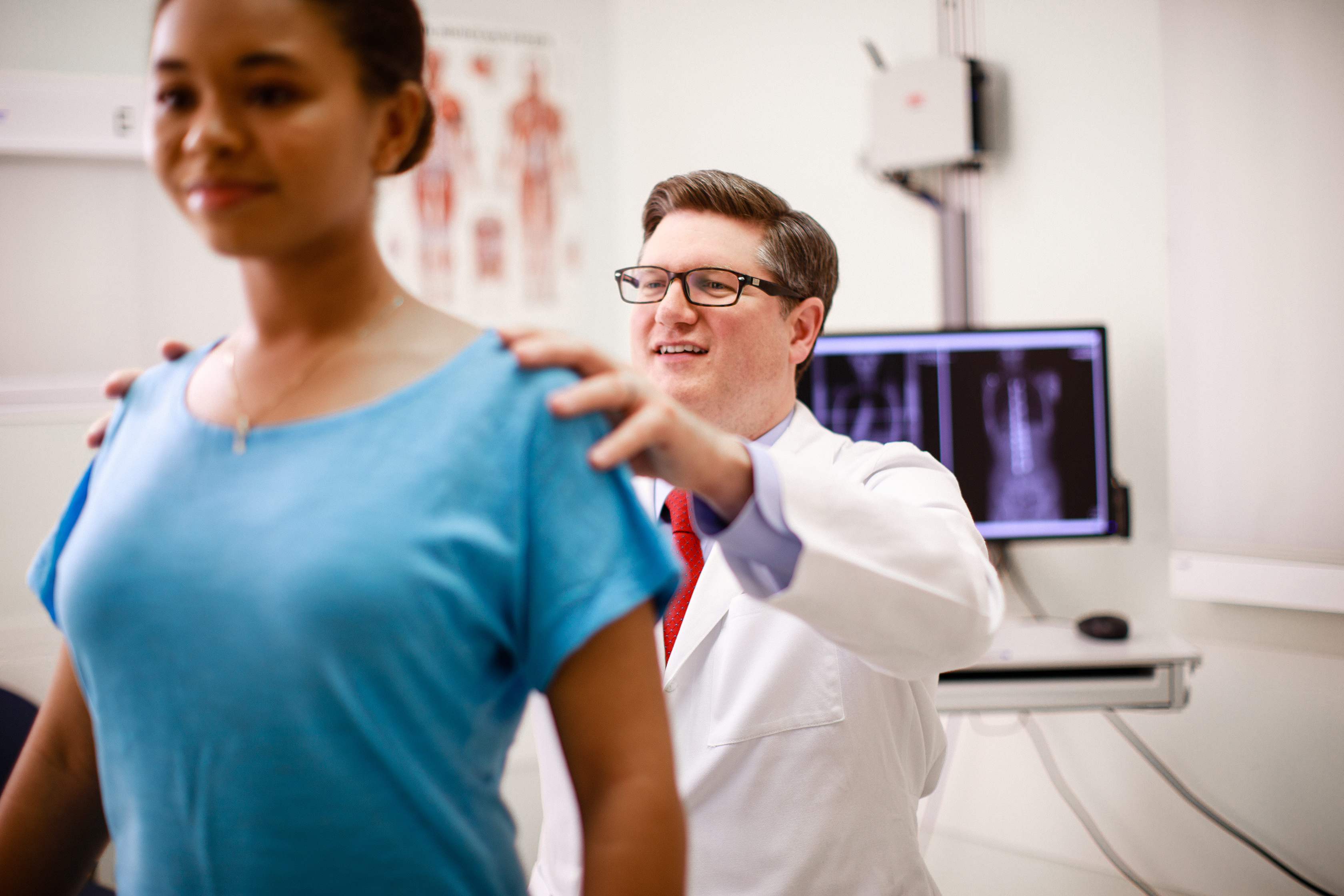 Orthopedic surgeon and patient.