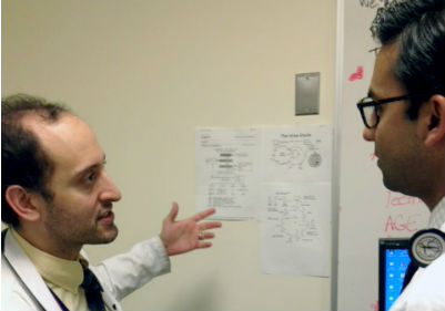 Two residents discuss their work in the Pediatrics and Medical Genetics Combined Residency Track