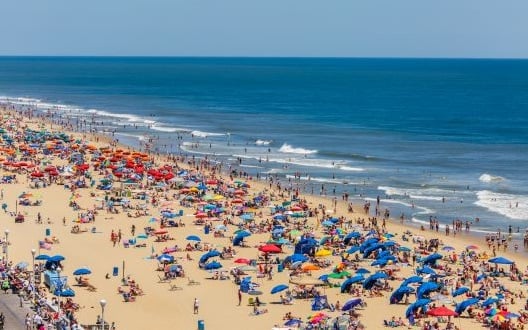 A crowded beach full of spring break vacationers