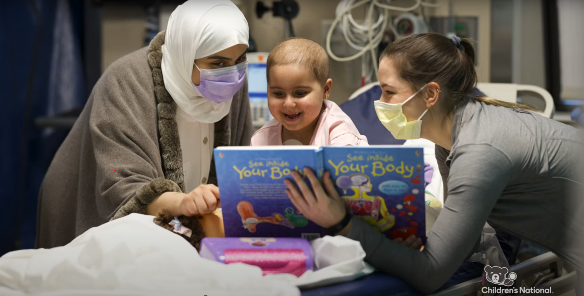 psychosocial team reading book to patient