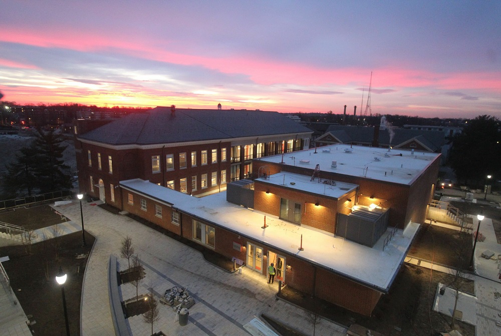 A view of the Rare Disease Institute at the Children's National Research & Innovation Campus at sunset