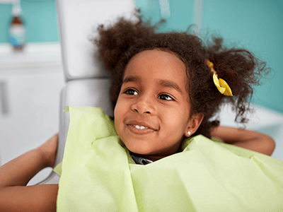 little girl at the dentist