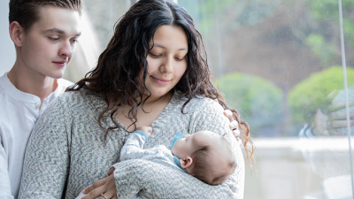 teen parents with baby