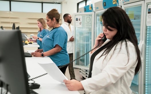 Team members at Children's National Specialty Pharmacy work on filling prescriptions