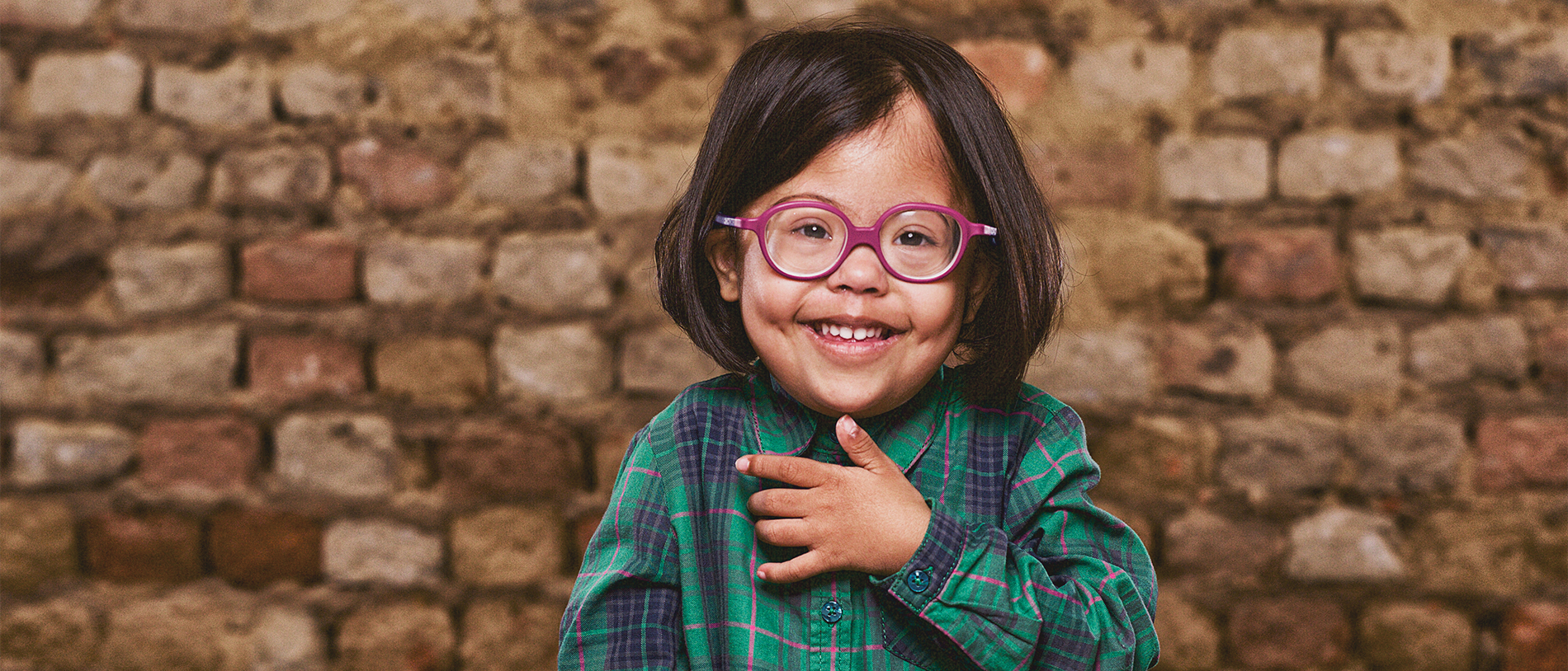 Child with down syndrome smiling