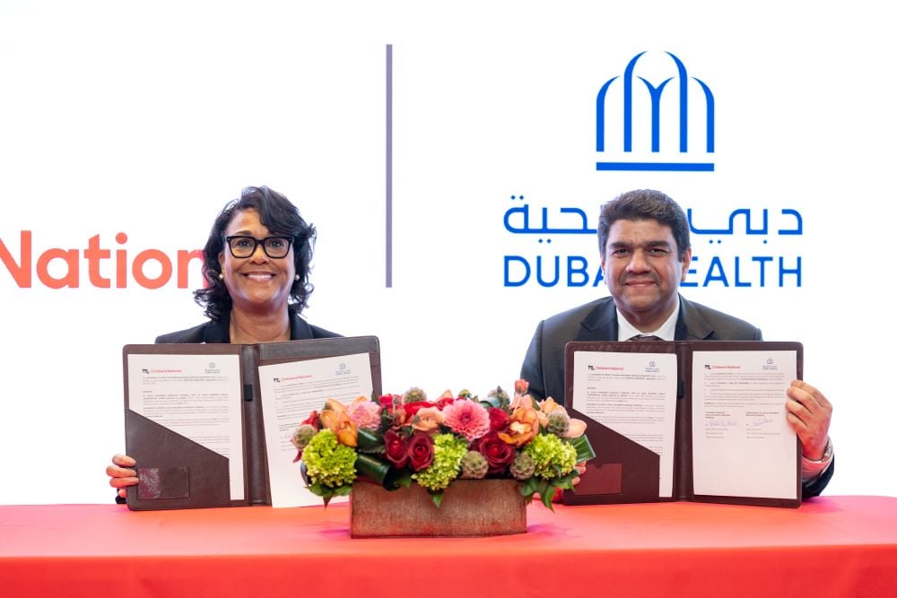 During an October 2024 visit to Children’s National Hospital, Dubai Health and Al Jalila Children's Specialty Hospital executives formalized a new partnership agreement with the pediatric hospital. (L to R): Michelle Riley- Brown, MHA, FACHE, Children’s National President and CEO; Dr. Amer Sharif, chief executive officer of Dubai Health.