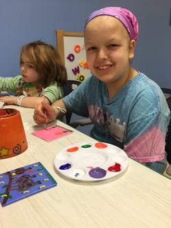 Juliana participating in art therapy