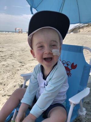 Nick as a toddler at the beach