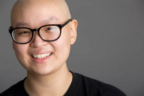 Smiling patient wearing glasses