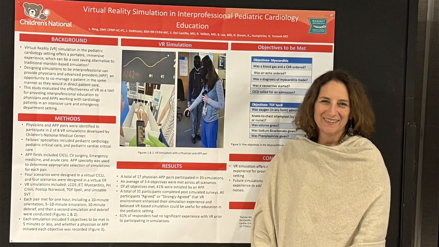 Provider standing next to their 2025 research poster.