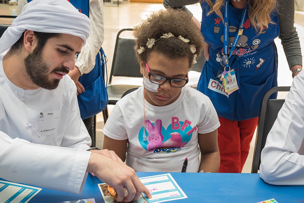girl and man at table 
