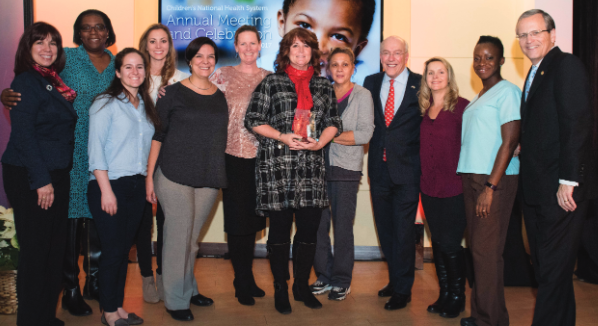 Group of people posing for a photo