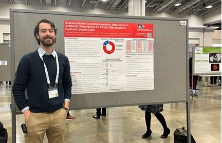 An Infectious Disease traditional track fellow with his poster presentation at Children's National.