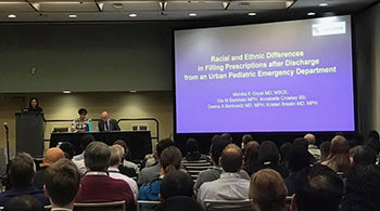 Presentator presenting to a crowd