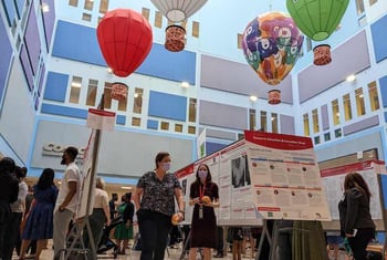 Participants during the poster sessions of REI Week 2022.