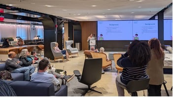 Attendees listen during one of the presentations of the April 2026 Research & Innovation Mixer.