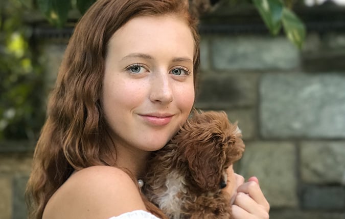 150 Years Stronger Patient Story Tia and puppy