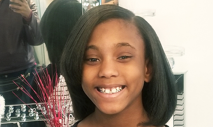 A close-up photo of a young patient.