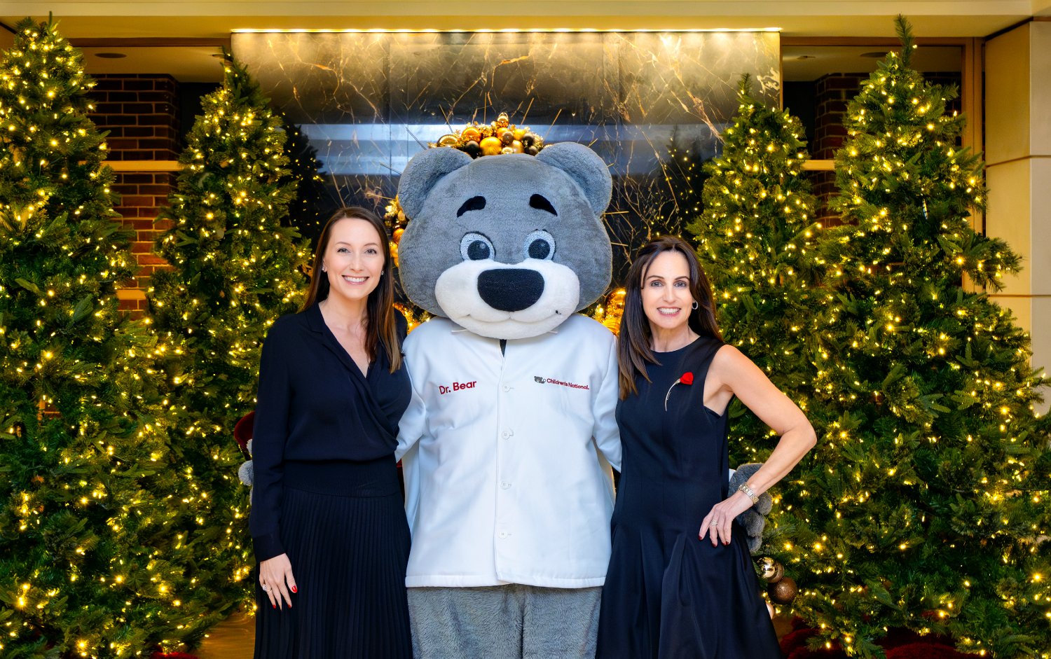 Dr. Bear and the Founders Auxiliary Board at Light Up the Season 2024