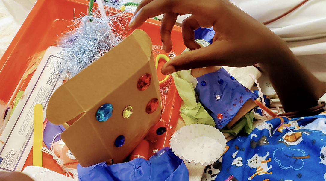 An up close look at a decorative arts-and-craft box created by a patient