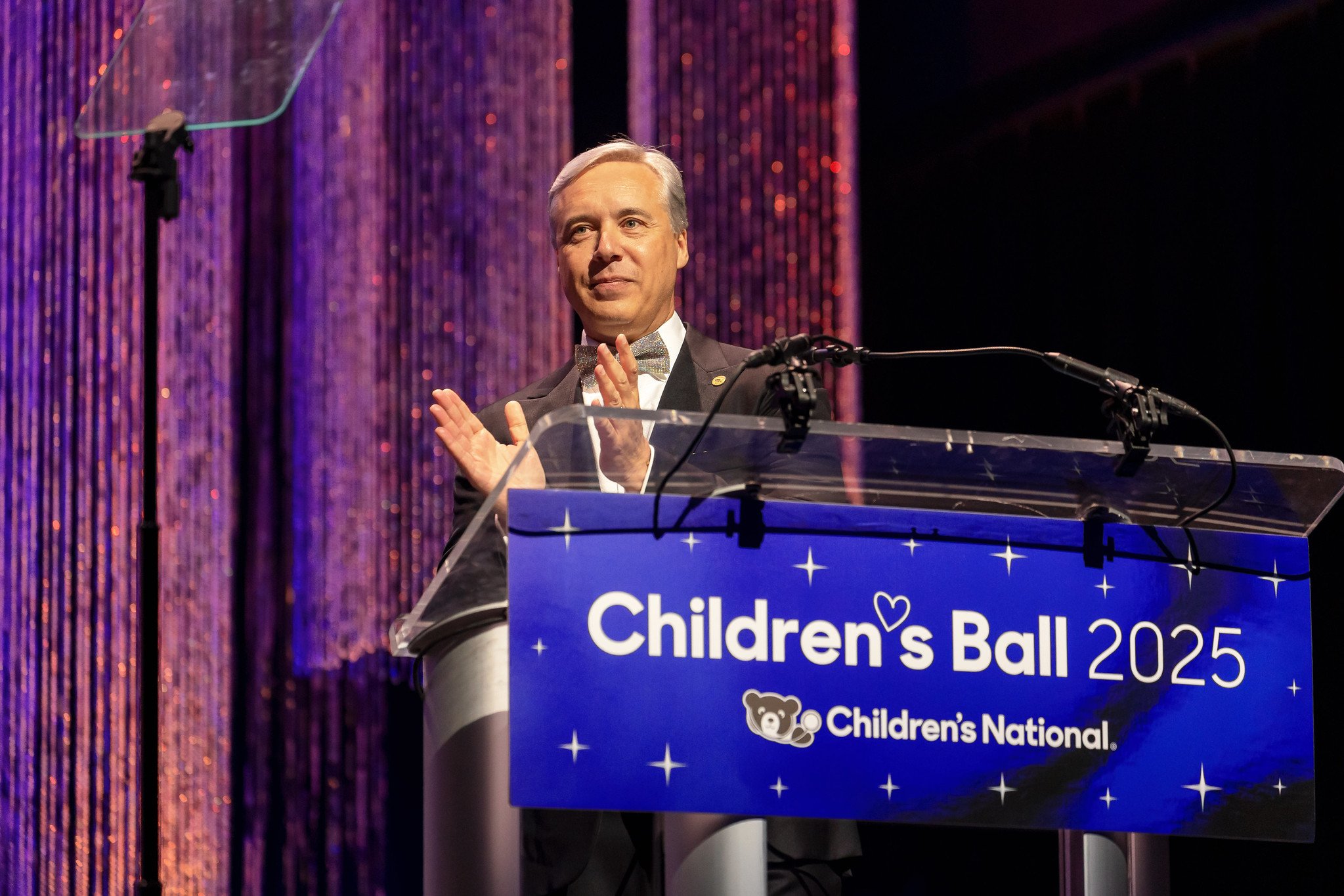 Horacio Rozanski, Booz Allen President and CEO, and Chair of the Children's National Board of Directors, greeting event attendees