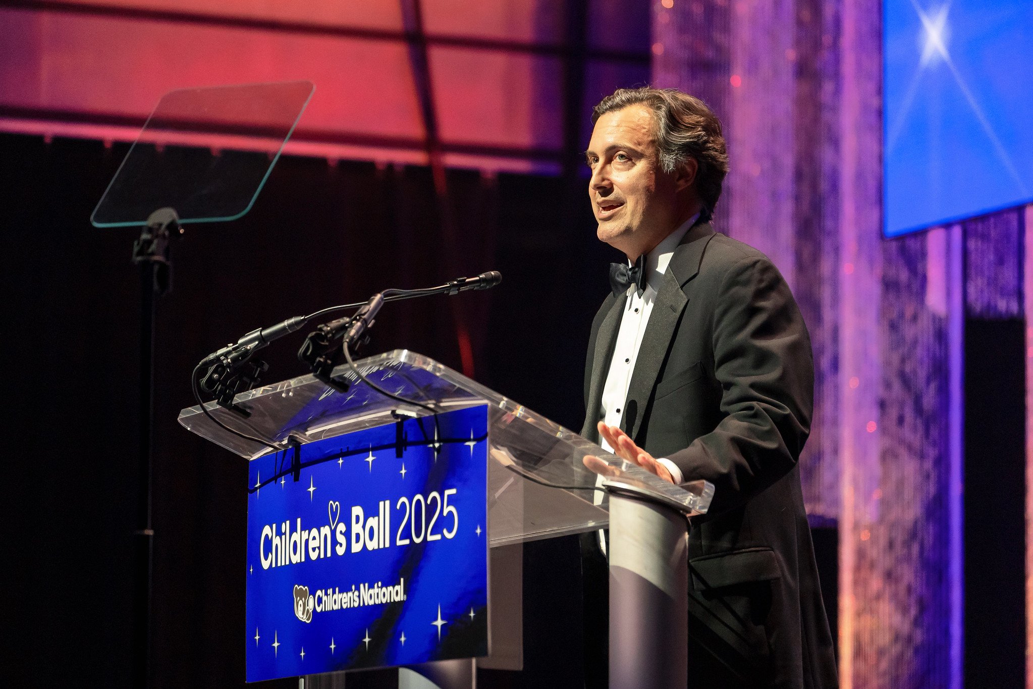 A representative from the Gerard B. Lambert Foundation accepting the Joseph E. Robert, Jr. Prize in philanthropy