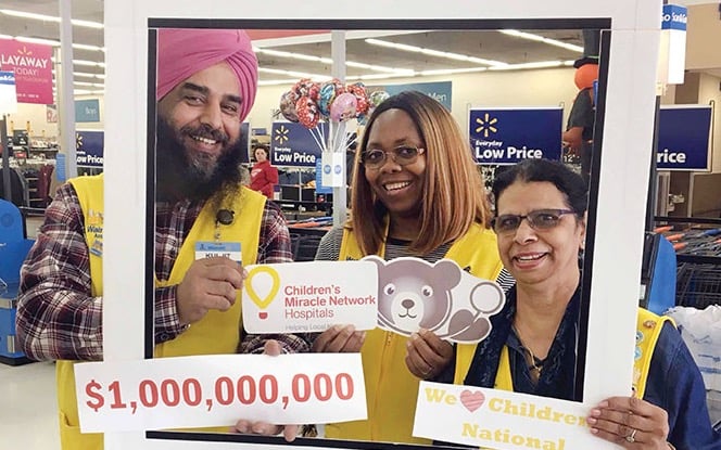 Fundraisers pose for an Instagram photo.