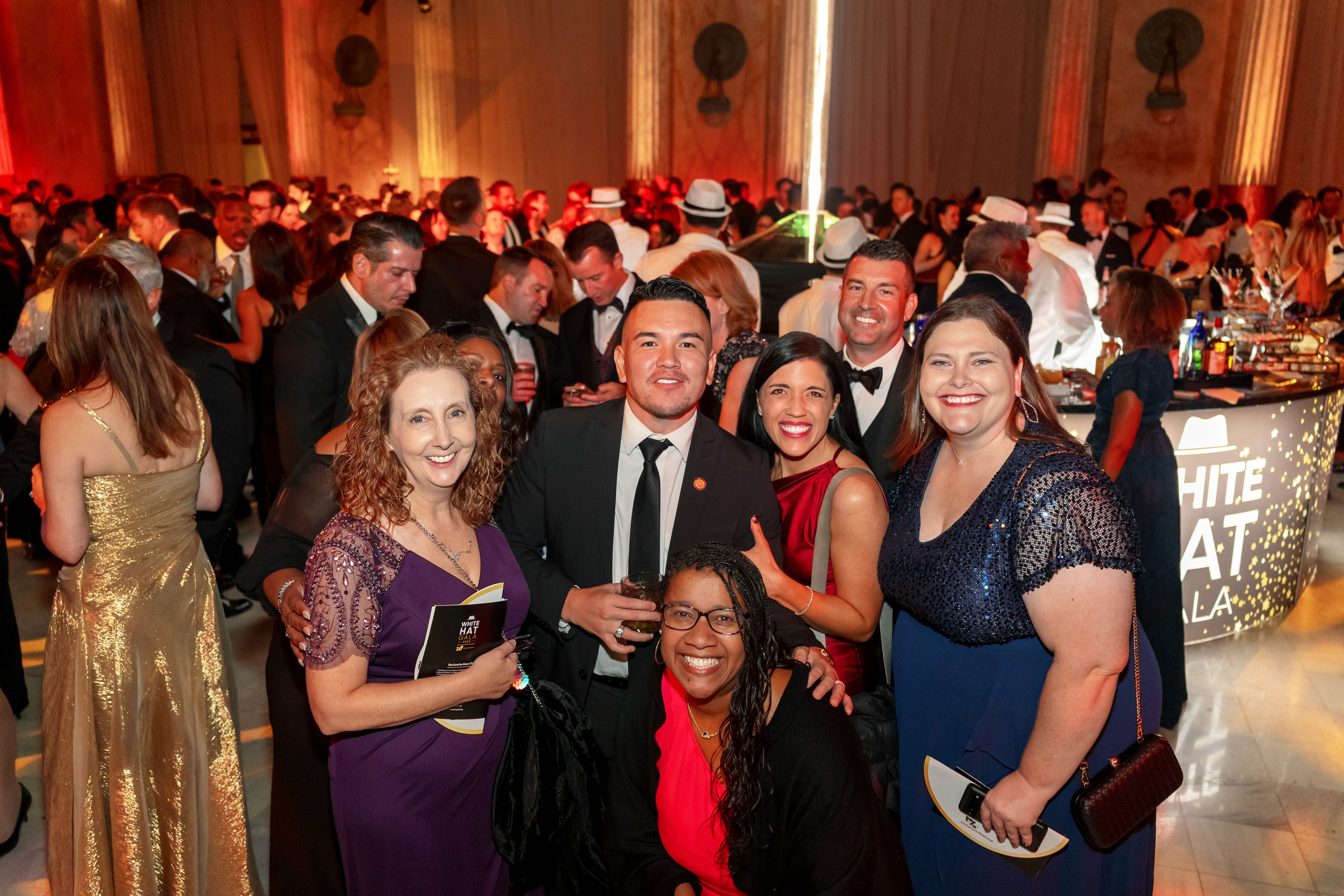 Attendees at the White Hat Gala 2026 pose for a picture.