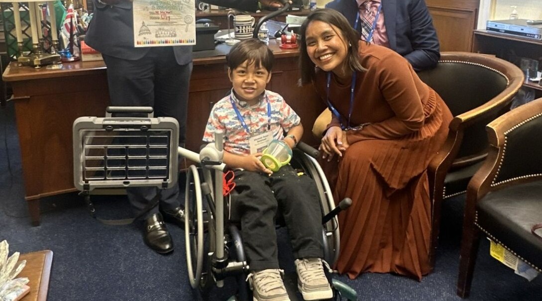 Uly and his mother visiting congressional offices in Washington, DC.