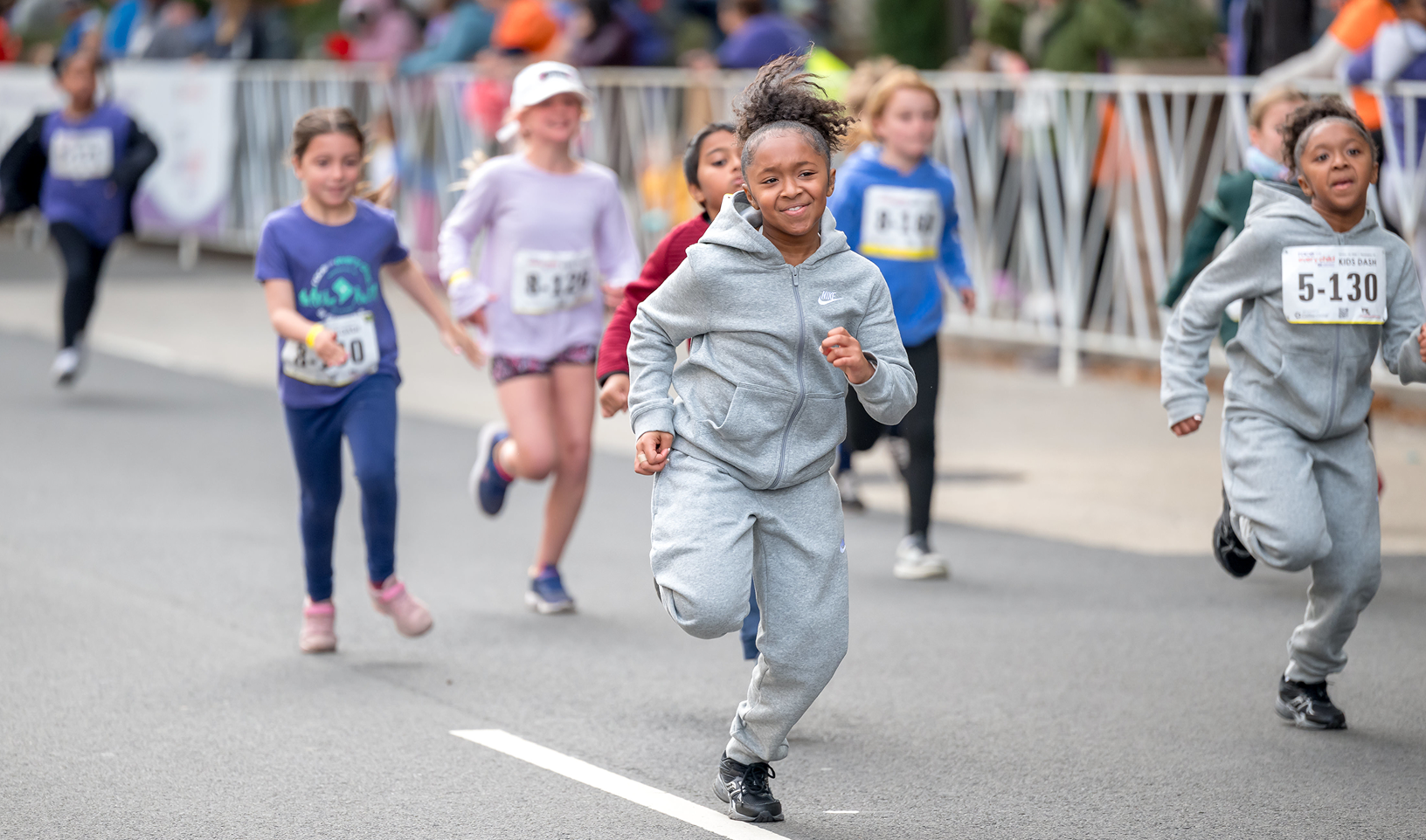 Children participating in the Kids Dash at the 2025 Race for Every Child event.