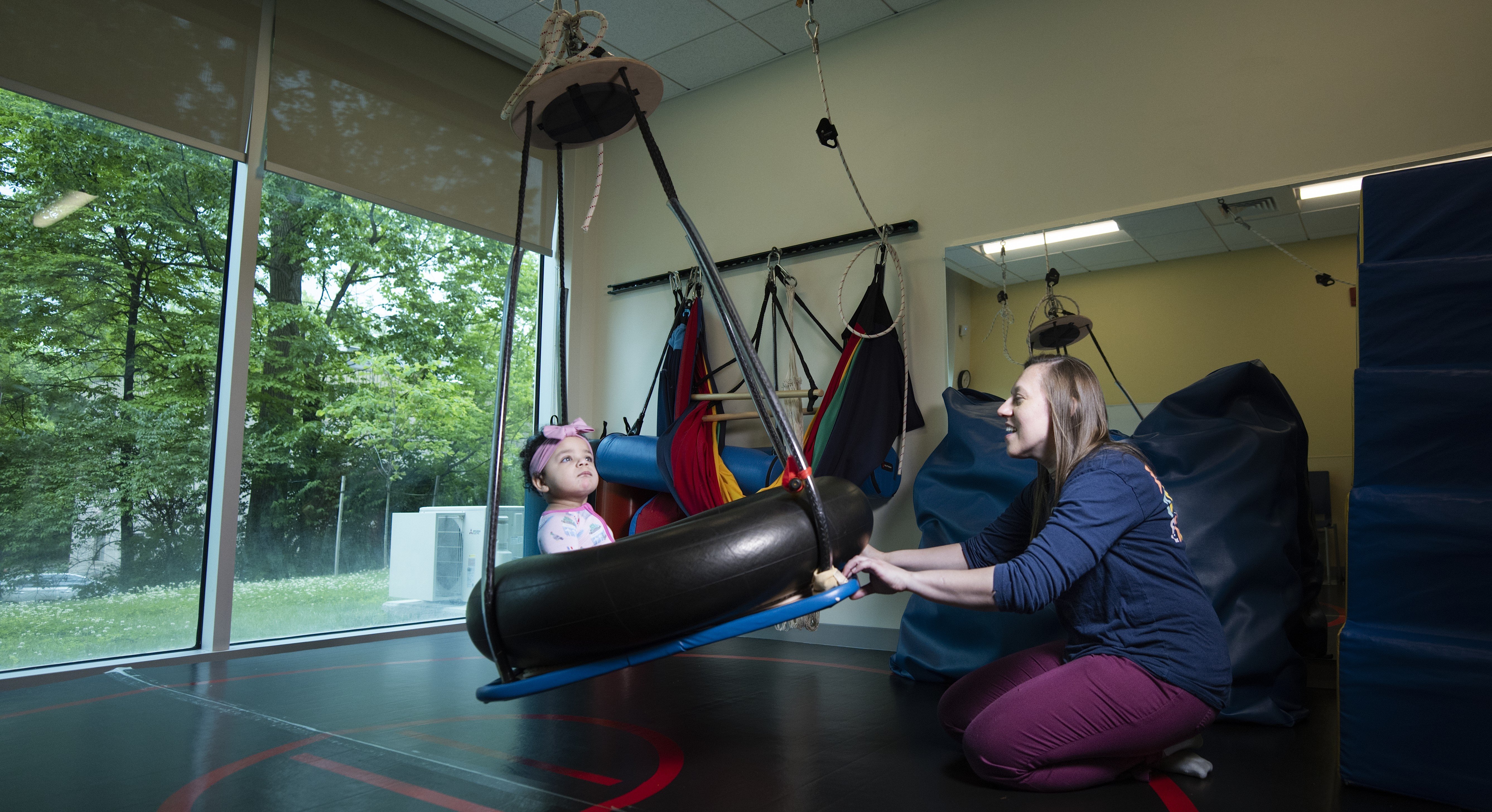 Ashley's daughter, Ella, during occupational therapy with Jennifer Short.
