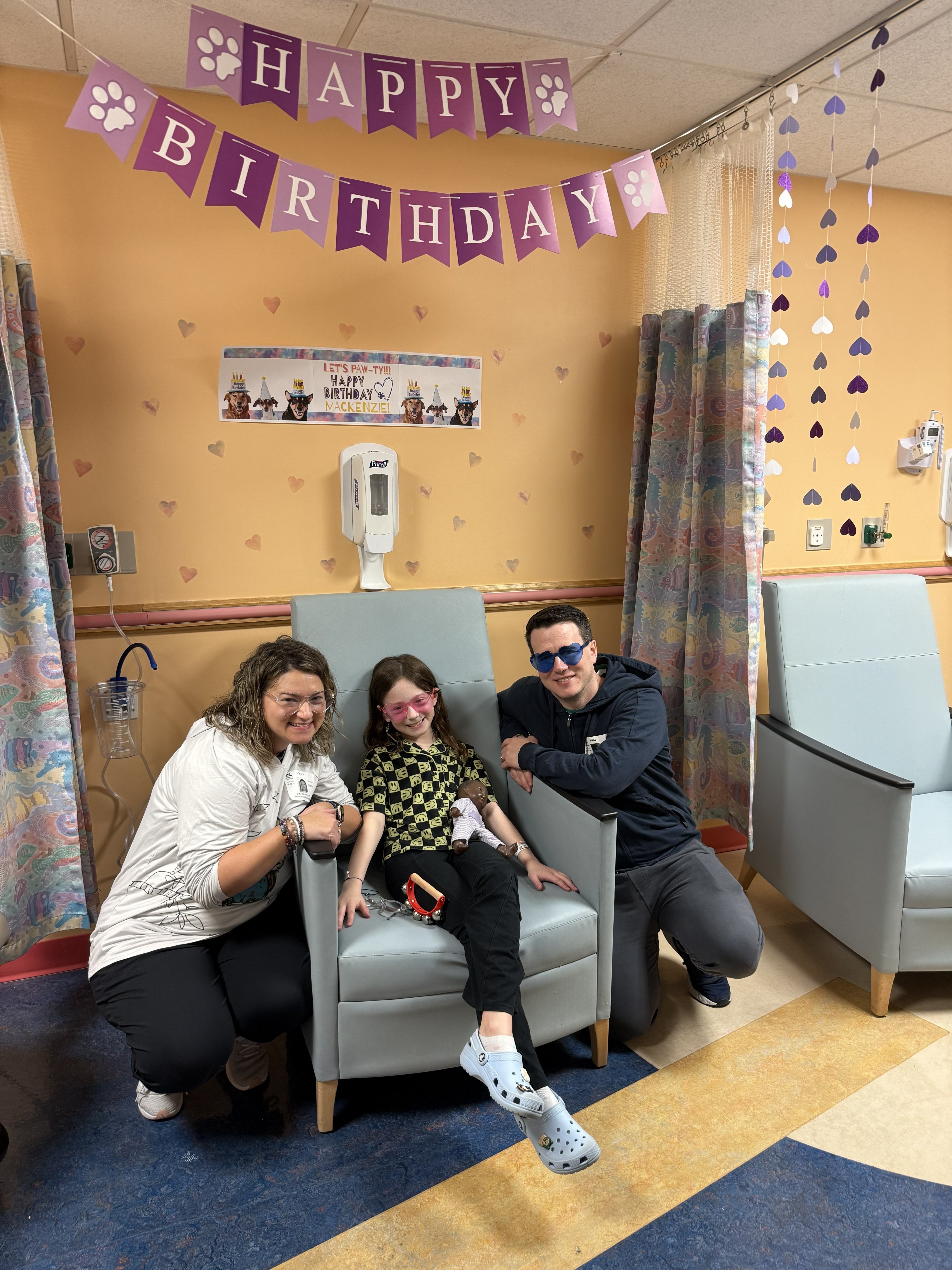 Mackenzie and her parents celebrate her birthday at the hospital.